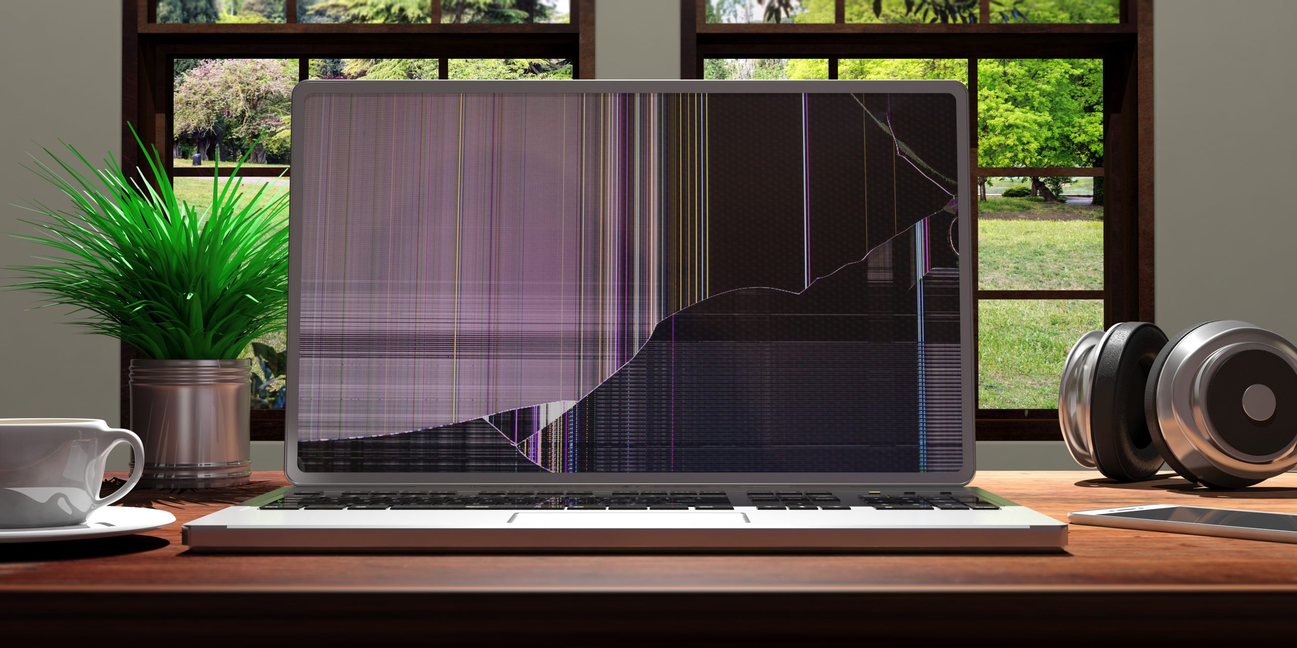 Laptop with broken screen on office desk. 3d illustration